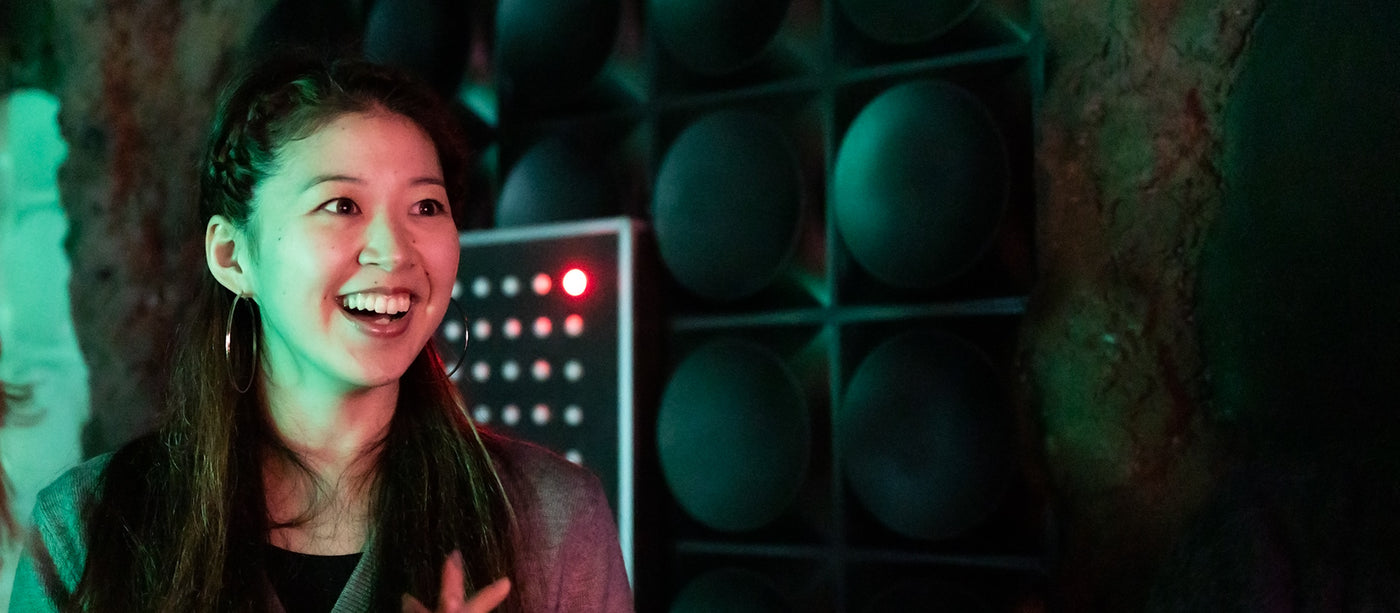 A studio escape guest enjoying an escape room experience.